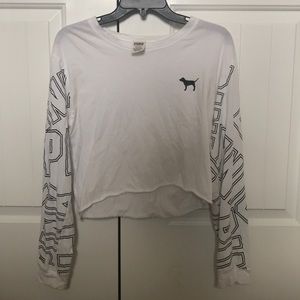 A pink vs crop top with long sleeves